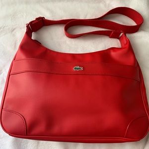 Lacoste cross body/shoulder bag/ authentic